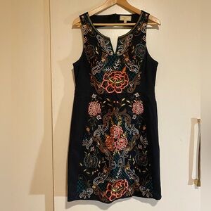 Embroidered A-line dress with pockets